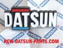 DATSUN 510 BLUEBIRD GRILL BADGE 