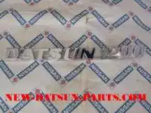 DATSUN 1200 COUPE TRUNK LID EMBLEM 